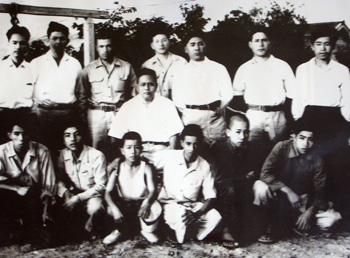 Miyagi Chojun with Students c1950. Seikichi Kinjo is standing on the back row, extreme right.
